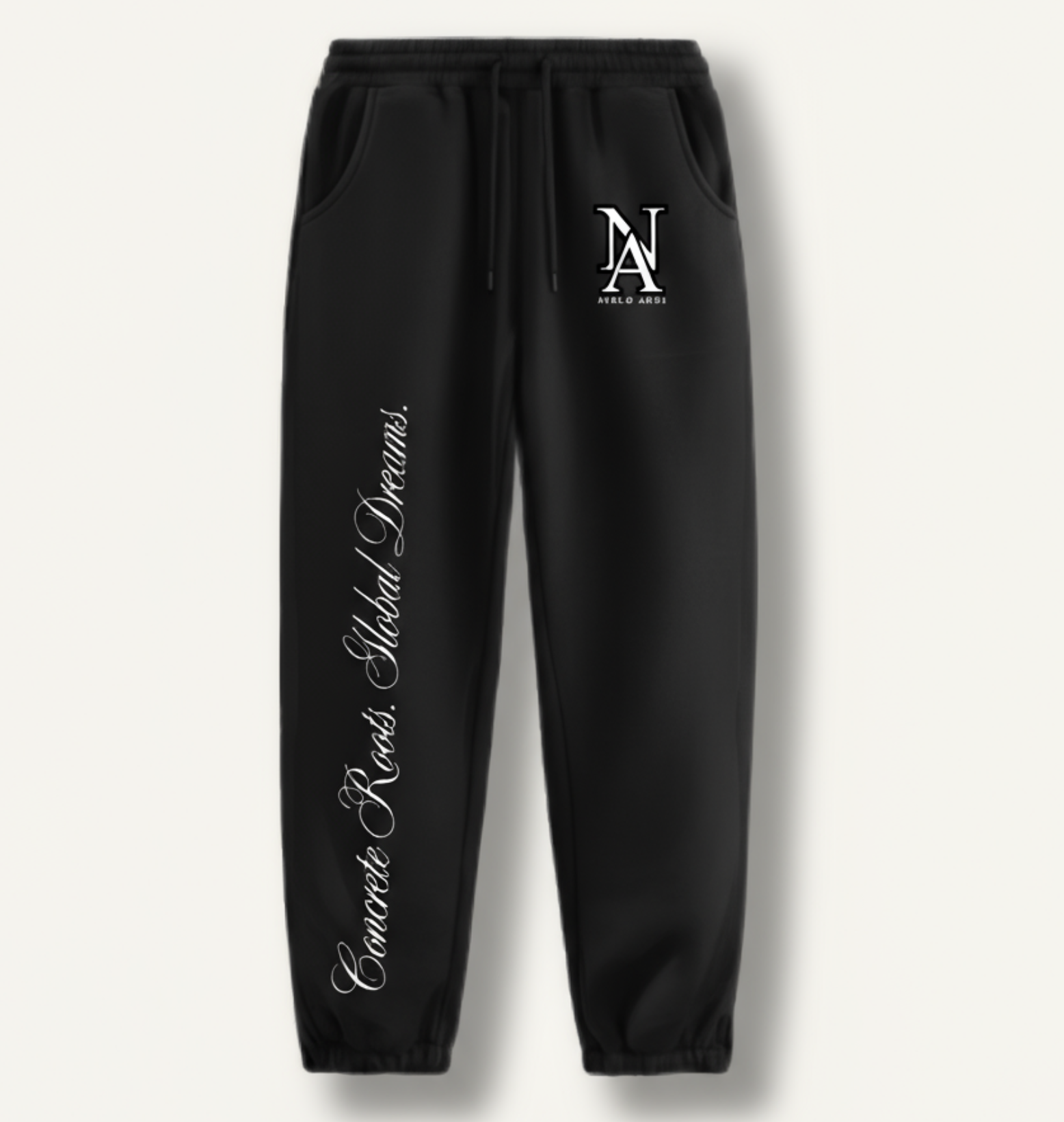 „Niklo Auri Concrete Roots Jogger – schwarze Jogginghose mit NA Logo und Script Print.“